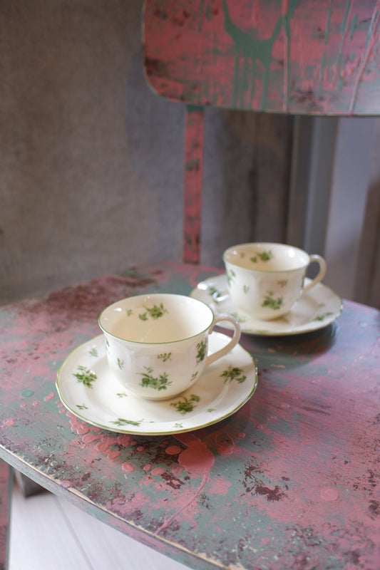 Green floral cup and saucer