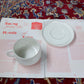 White cup and saucer