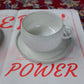 White cup and saucer